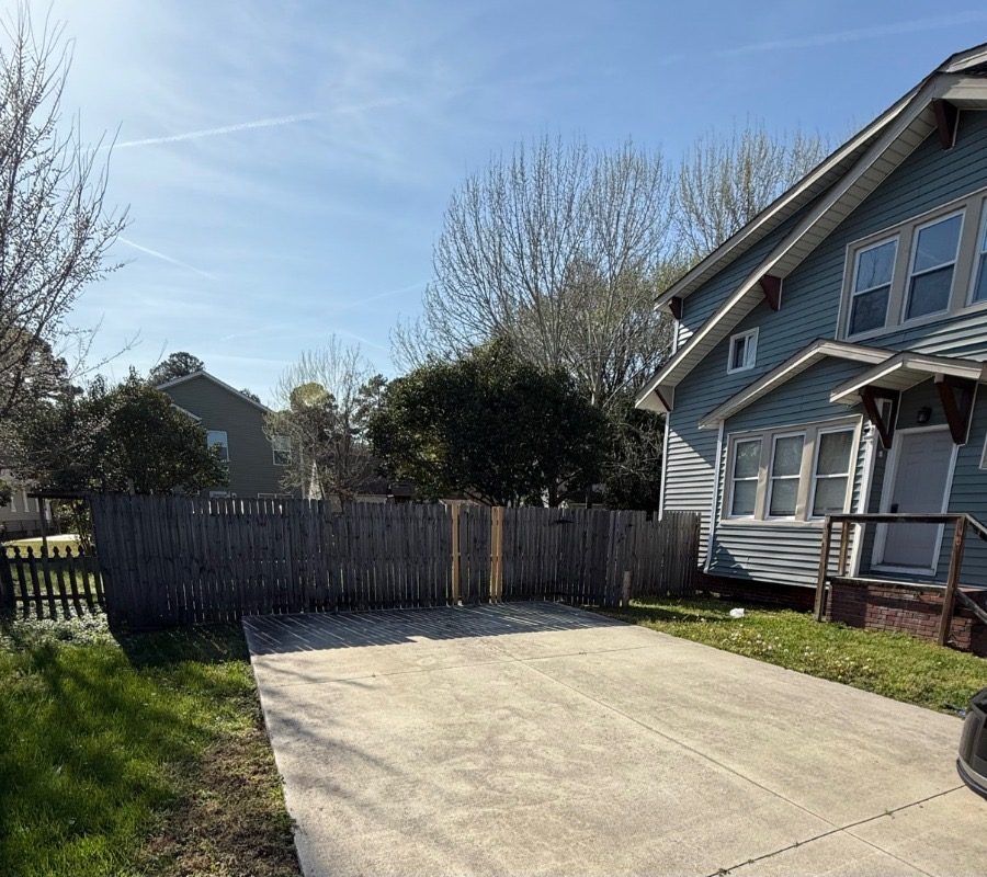 Privacy fence and patio before